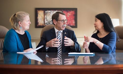 Photographed from left: Kim Nichols, MD, director of St. Jude Cancer Predisposition, James R. Downing, MD, St. Jude CEO and President, and study co-PI Jinghui Zhang, PhD, chair of St. Jude Computational Biology.