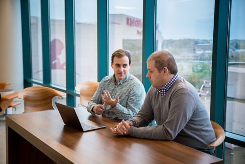 Scott Newman, PhD, with Clay McLeod, manager of the St. Jude Cloud development team