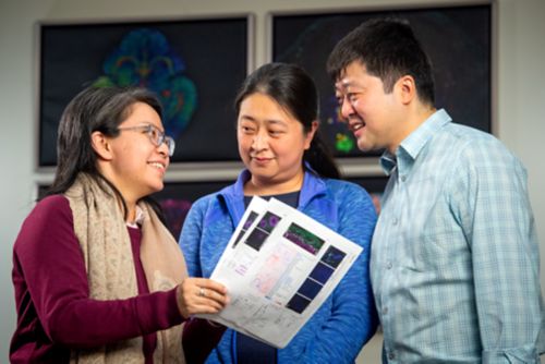 Three people talking about pediatric brain tumors