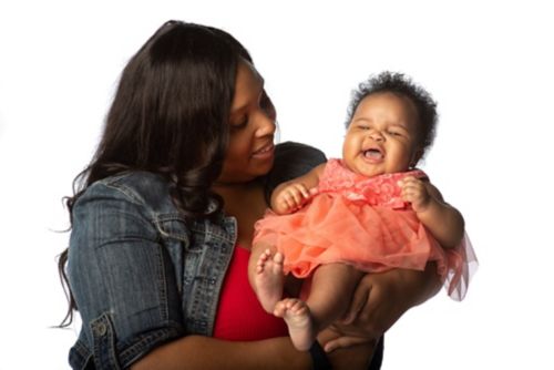 Mother holding infant 