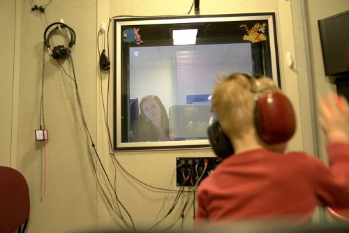During an audiogram, the person wears earphones and listens for sounds of different pitches and degrees of loudness. 