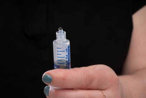 IV Syringe is clear with a centered tip 