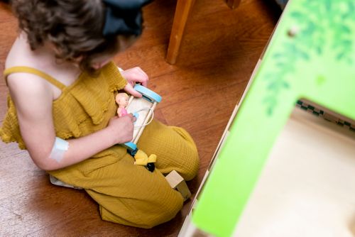 Child playing with toy