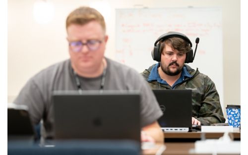 Two male participants at the St. Jude hackathon