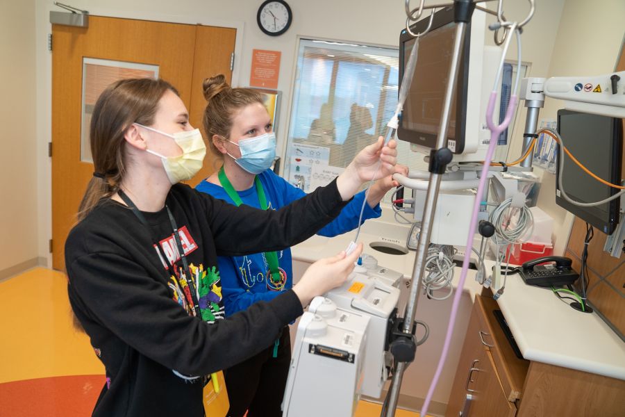 Two nurses working together