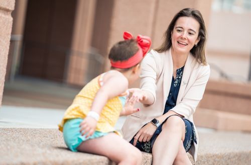 Victoria Willard, PhD and a patient at St. Jude.
