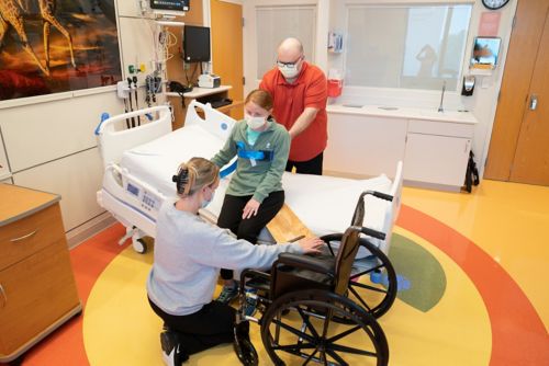 Help your child sit on the board.