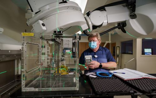 man working in radiation lab