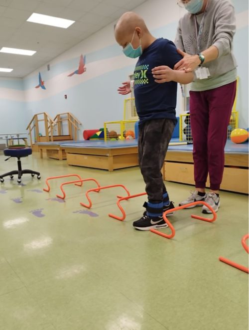 boy in physical therapy