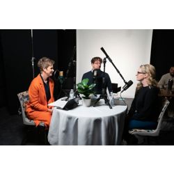 Paula Elsener, Jason Winkle, and Erica Sirrine sitting at table recording