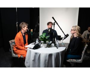 Paula Elsener, Jason Winkle, and Erica Sirrine sitting at table recording