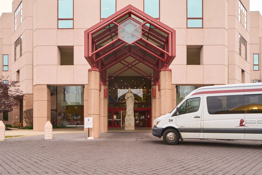 Exterior of St. Jude building with shuttle van parked