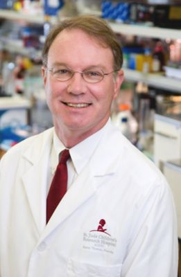 Photo of Dr. William Evans in white coat