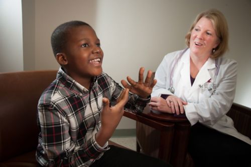 doctor and young patient talking 