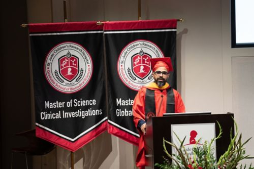 image of man in graduation robes