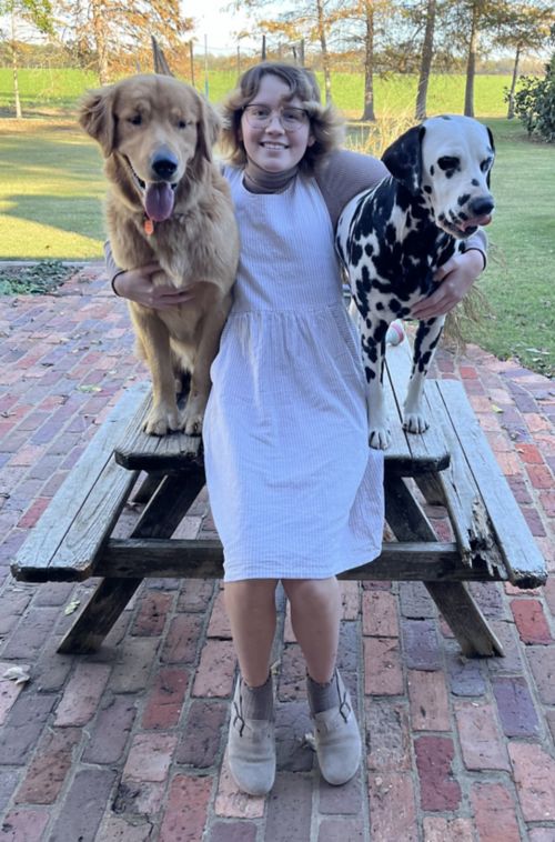 Maddy with two of her dogs