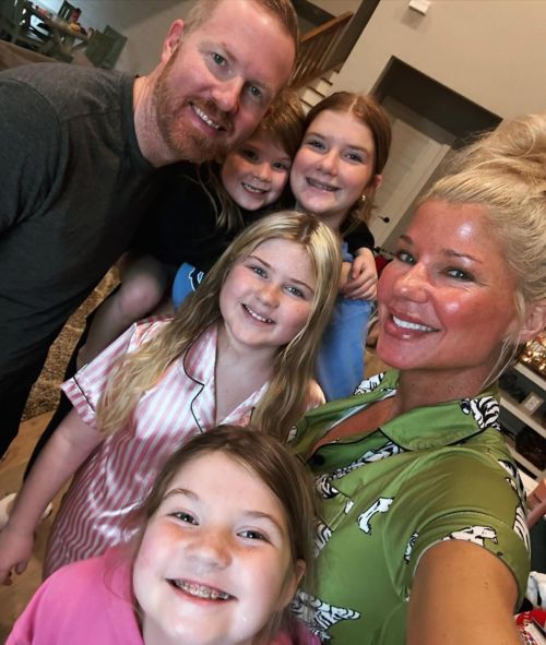 Joshua with his wife and three children