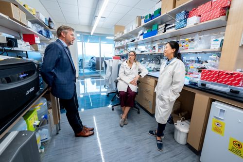 Paul Taylor, Ane Korff, Hong Joo Kim in lab research setting