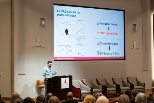 Man giving lecture in auditorium