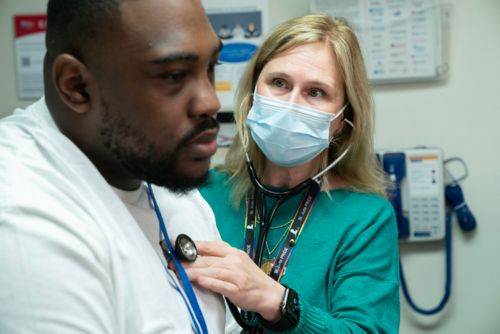 A patient receiving a health evaluation