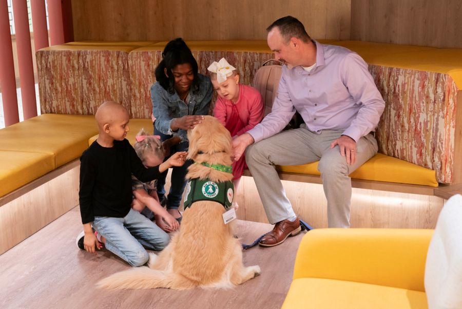 Group of pediatric cancer patients pet dog