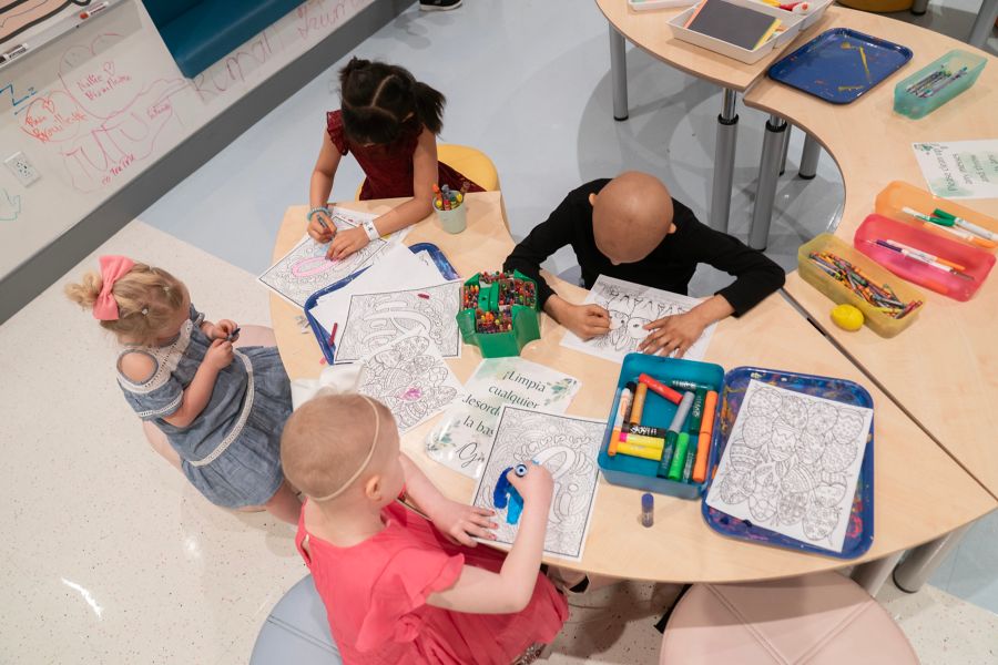 Children at art table in Family Commons