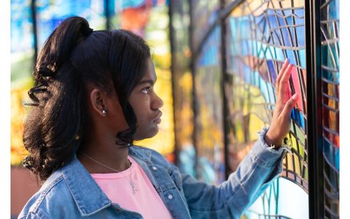 Teen girl at chapel in St. Jude Children's Research Hospital