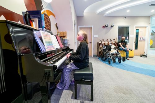 Girl playing a piano