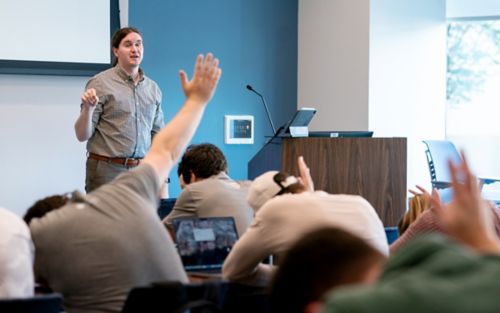 image of Brian Abraham in front of class