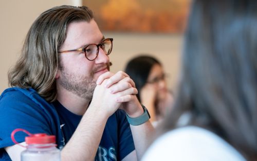 photo of man in class