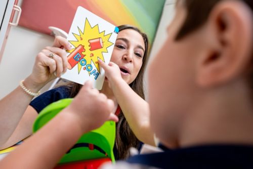 A speech language pathologist with a child patient