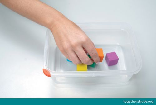 Blocks in a plastic bin