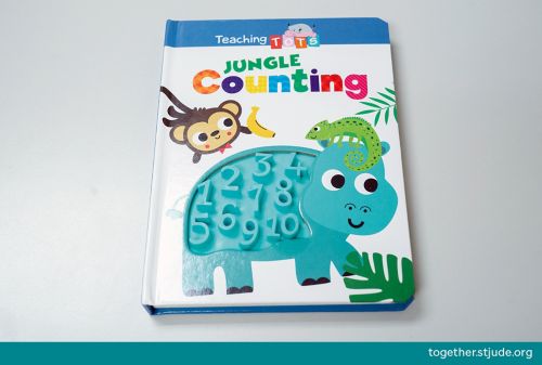 The cover of the Jungle Counting picture book