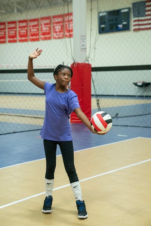 McKenley playing volleyball