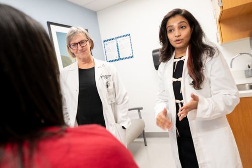 Owen Phillips and Nidhi Bhatt