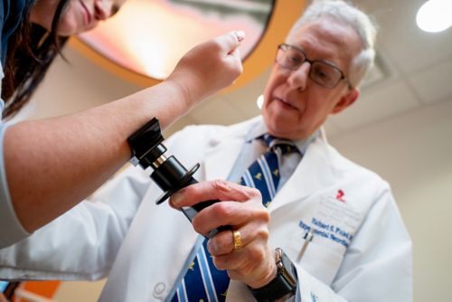 Richard Finkel with patient