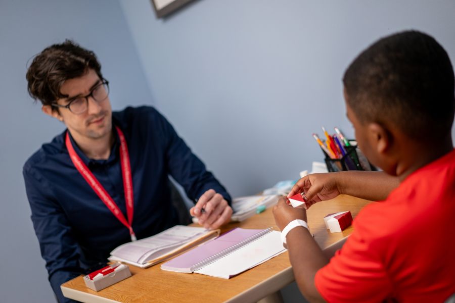 Two people sitting at a desk