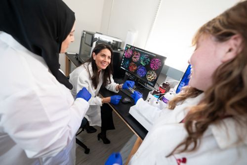 Jasmine Plummer and two lab members