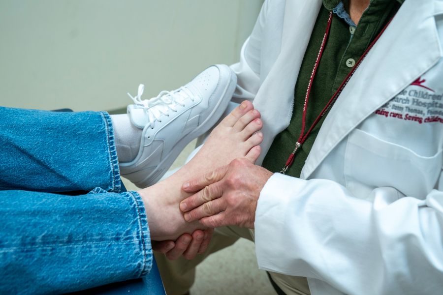 Doctor examining patient's foot