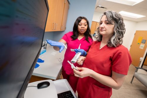 Two nurses working in a clinic