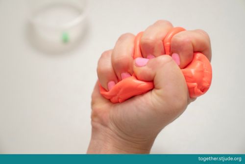 Squeezing putty in hand