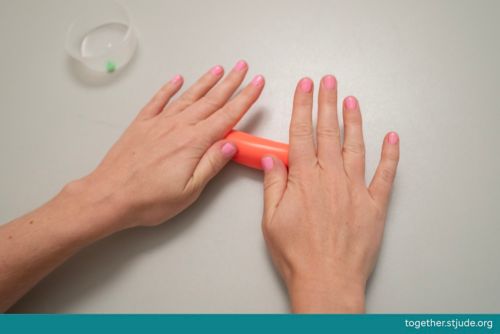 Rolling putty on table