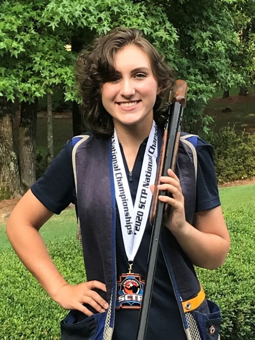 Emily with her medals for Tennessee Scholastic Clay Target Program State Championship