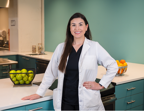 Kimberly Boone standing in a kitchen space