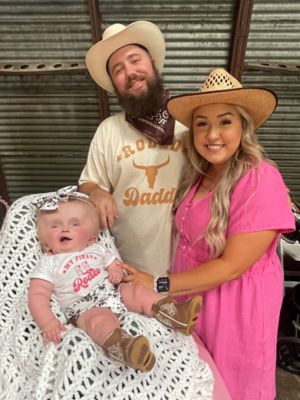 Fletcher, Billy and Stevee Fazenbaker at Fletcher’s rodeo-themed first birthday party.