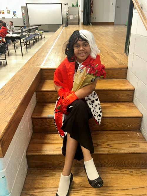 Alana in a Cruella costume