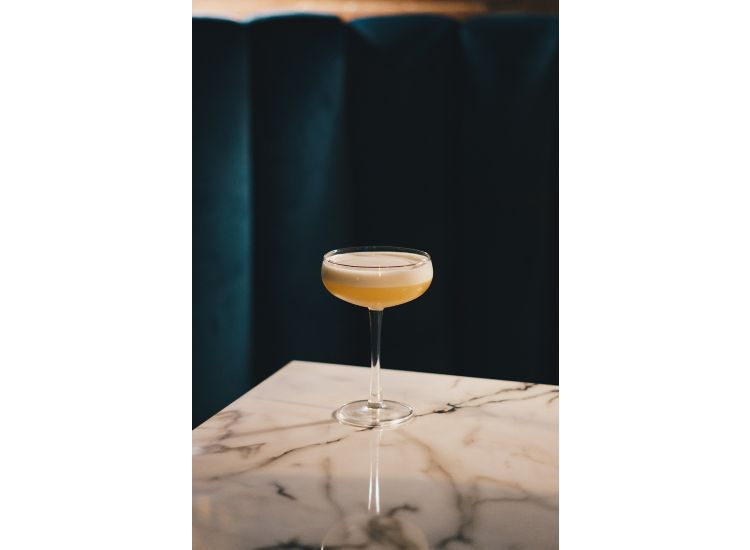 Image of cocktail on marble-finished table