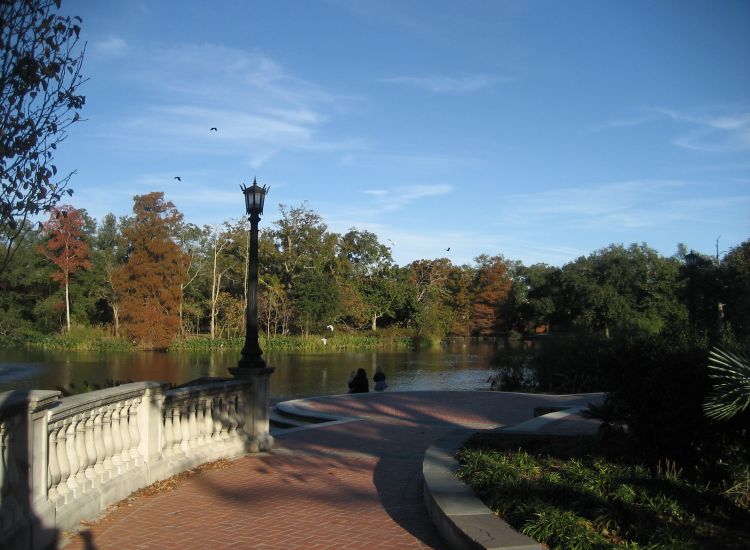 Curved pathway leading to a pond in Audubon Park