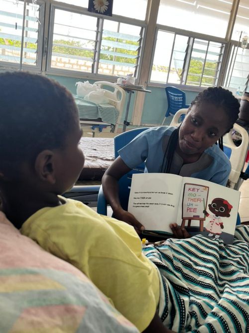 Woman reading to child 