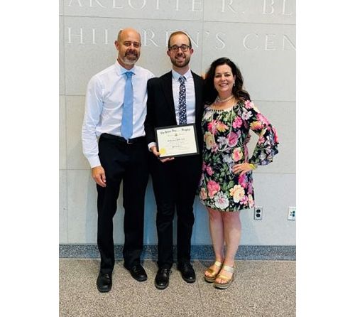 Brad Muller at his graduation with family